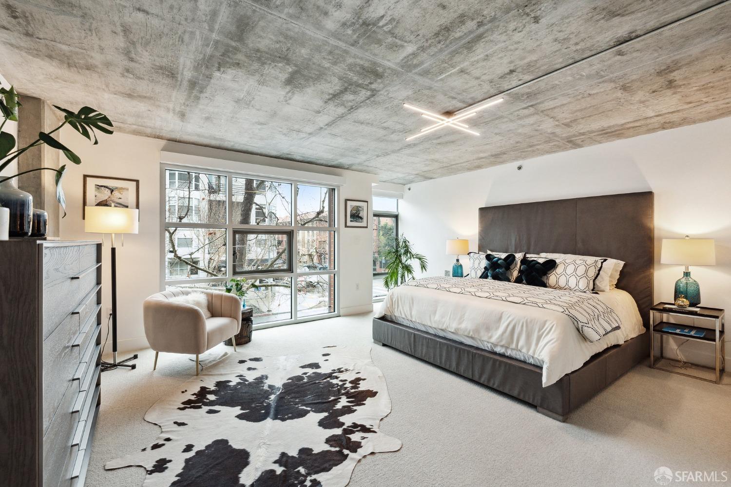 200 Brannan Street, Unit 130 San Francisco, CA 94107 - Photo 23 of 43 a bedroom with bed couch and window