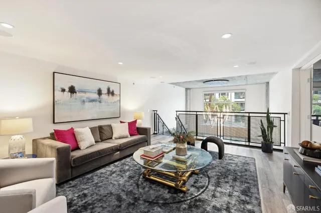 a utility room with dryer washer and a view of bathroom
