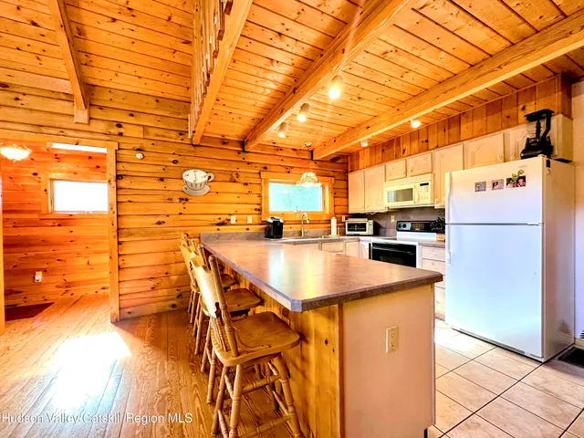 a storage room with an empty kitchen