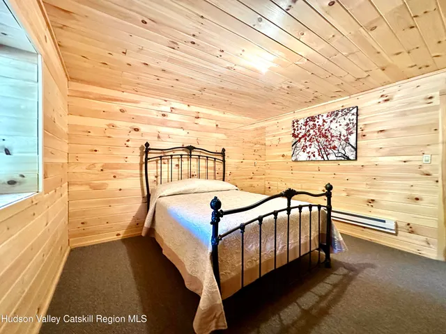 a view of a balcony with yard