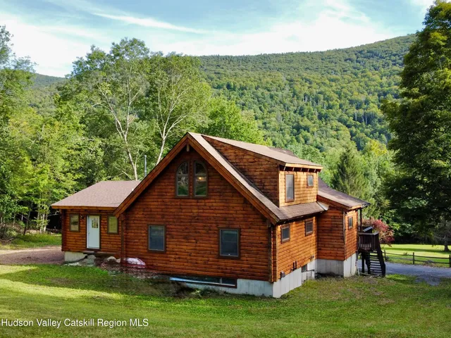 a view of a house with a swimming pool