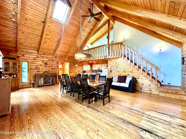 a view of a livingroom with furniture and a garage