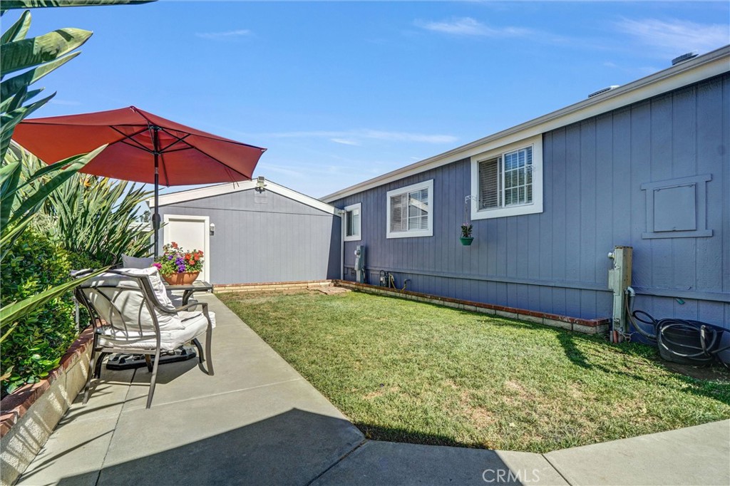 1051 Site Drive, Unit 51 Brea, CA 92821 - Photo 1 of 32 a backyard of a house with seating space
