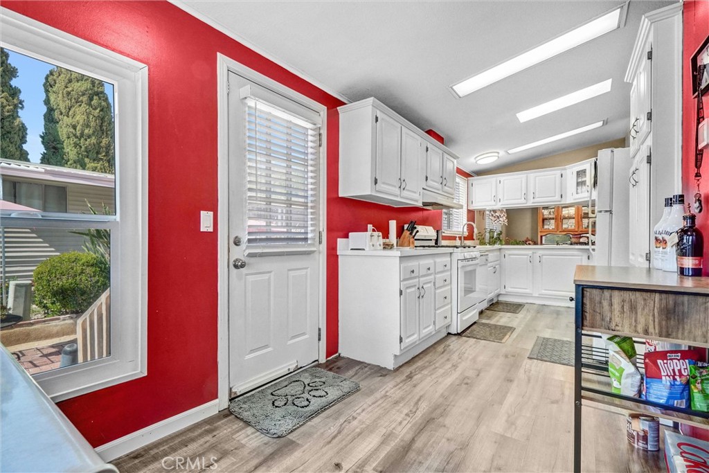 1051 Site Drive, Unit 51 Brea, CA 92821 - Photo 12 of 32 a view of a kitchen with furniture and window