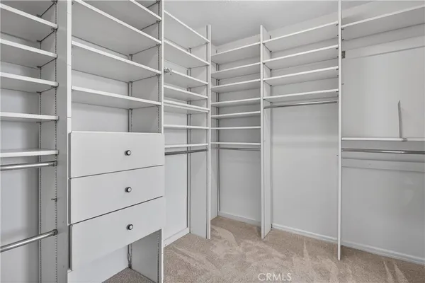 a bathroom with a sink a mirror and a toilet