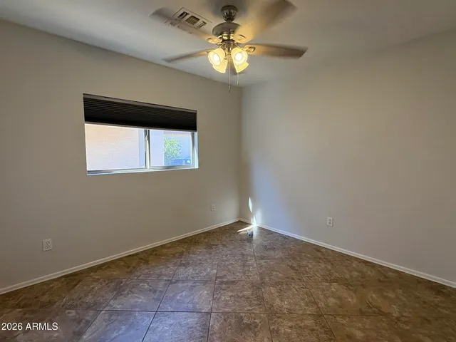 a view of a backyard of the house