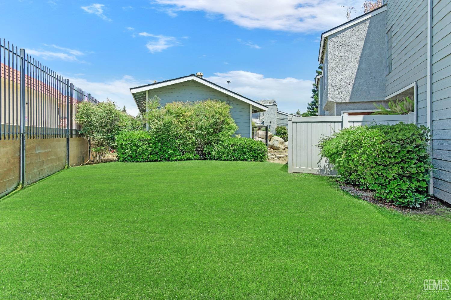 Undisclosed Address Bakersfield, CA 93309 - Photo 37 of 38 a view of a house with a yard