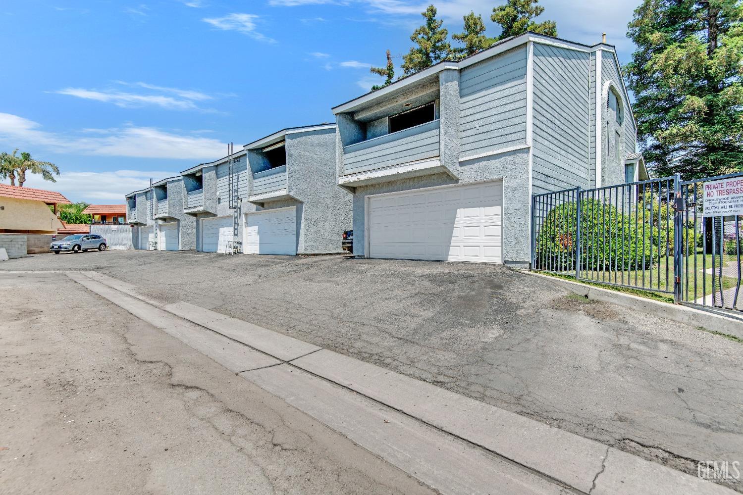 Undisclosed Address Bakersfield, CA 93309 - Photo 8 of 38 a view of a house with a street