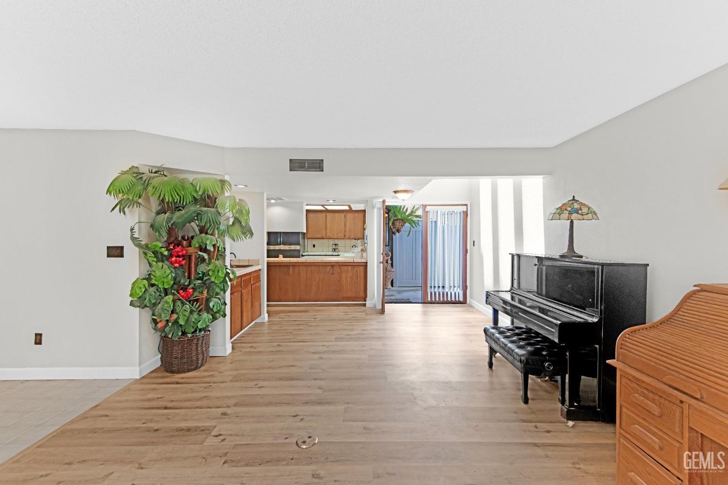 Undisclosed Address Bakersfield, CA 93309 - Photo 9 of 38 a view of a living room