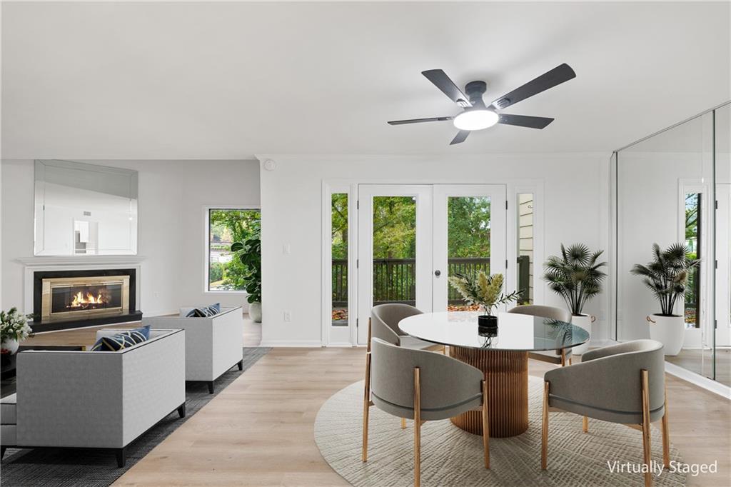 11 Forrest Place Northeast Atlanta, GA 30328 - Photo 1 of 1 a living room with furniture and a window