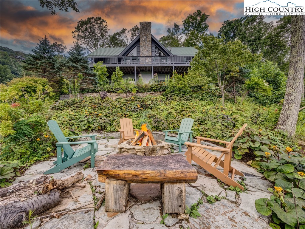 885 John Erwin Road Banner Elk, NC 28604 - Photo 2 of 50 a view of a table and chairs in patio