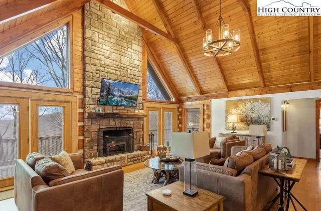 a living room with furniture or fireplace and a wooden floor