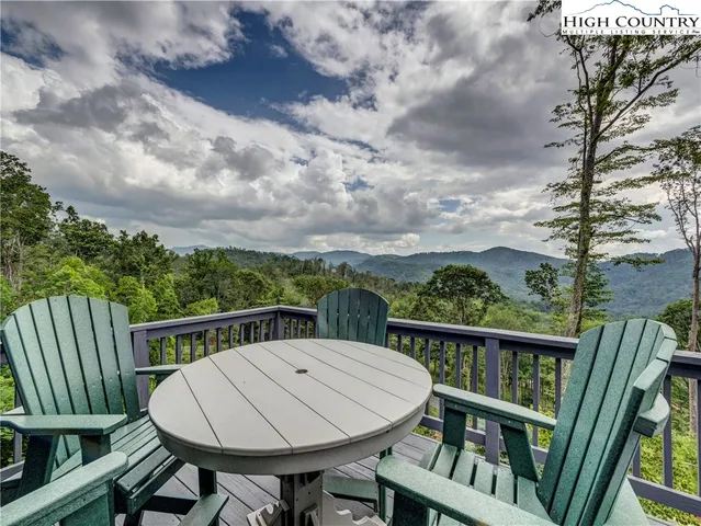 a view of a balcony dining and furniture