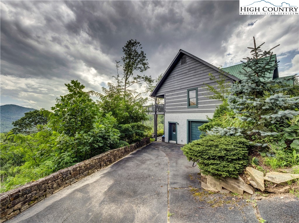 885 John Erwin Road Banner Elk, NC 28604 - Photo 44 of 50 a house with a yard