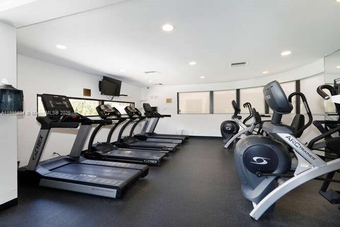 251 Crandon Boulevard, Unit 202 Key Biscayne, FL 33149 - Photo 16 of 24 a view of a room with gym equipment