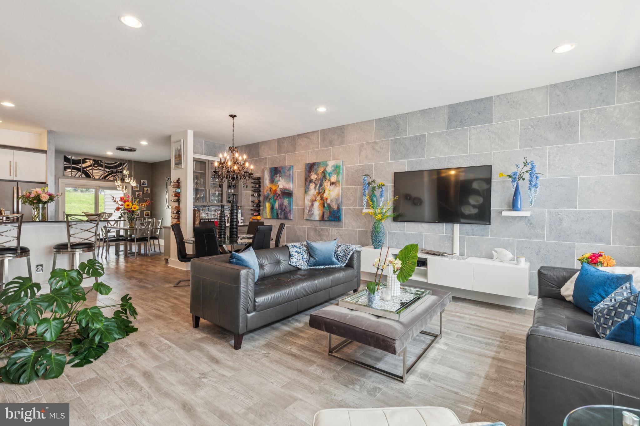 2303 Roma Drive Philadelphia, PA 19145 - Photo 12 of 80 a living room with furniture and a flat screen tv