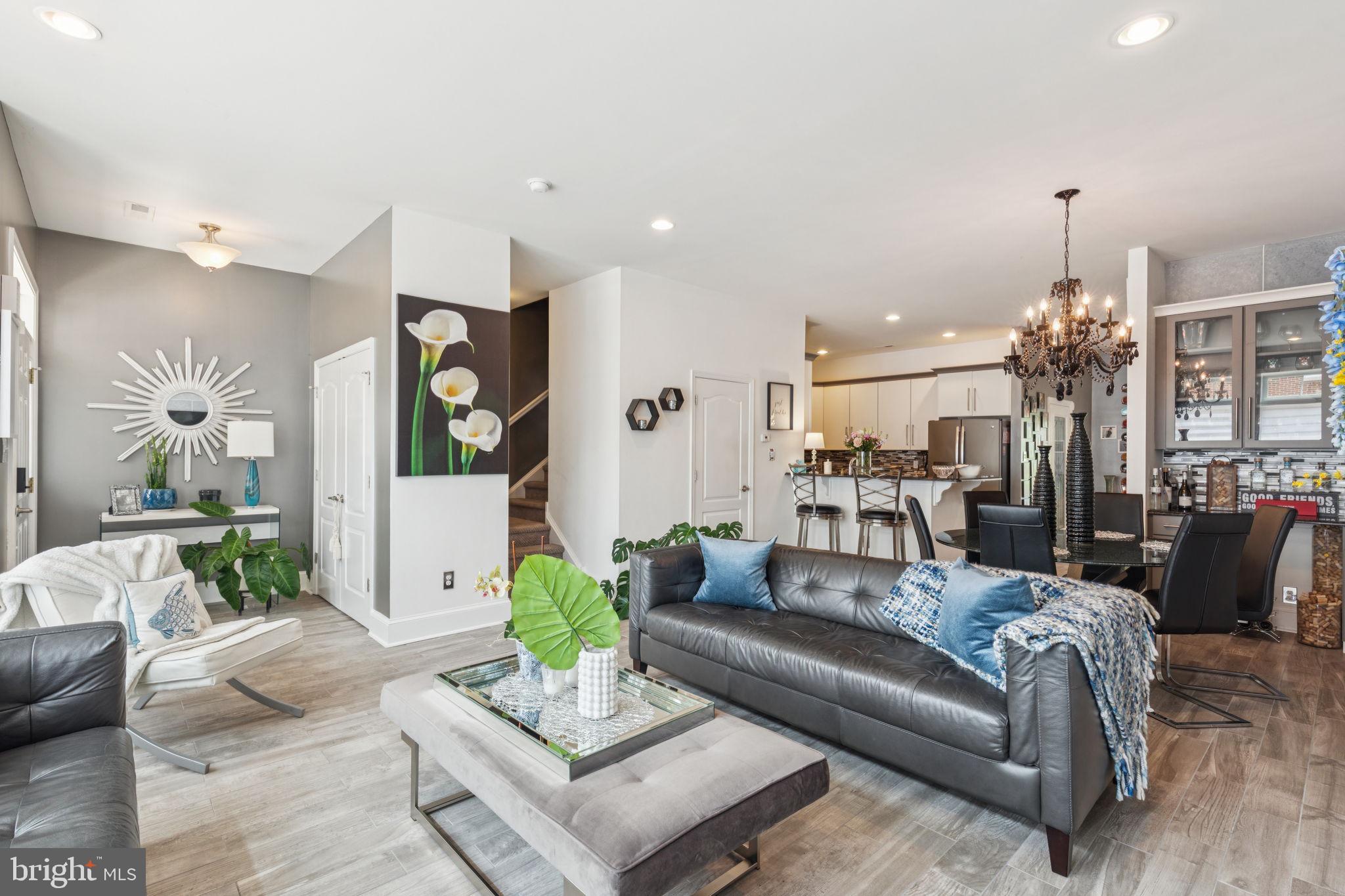 2303 Roma Drive Philadelphia, PA 19145 - Photo 14 of 80 a living room with furniture and a chandelier