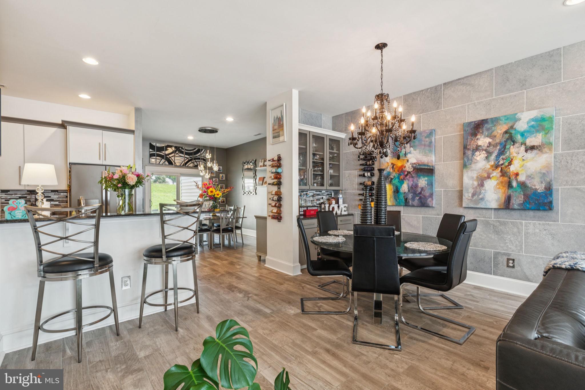 2303 Roma Drive Philadelphia, PA 19145 - Photo 17 of 80 a living room with furniture and a chandelier