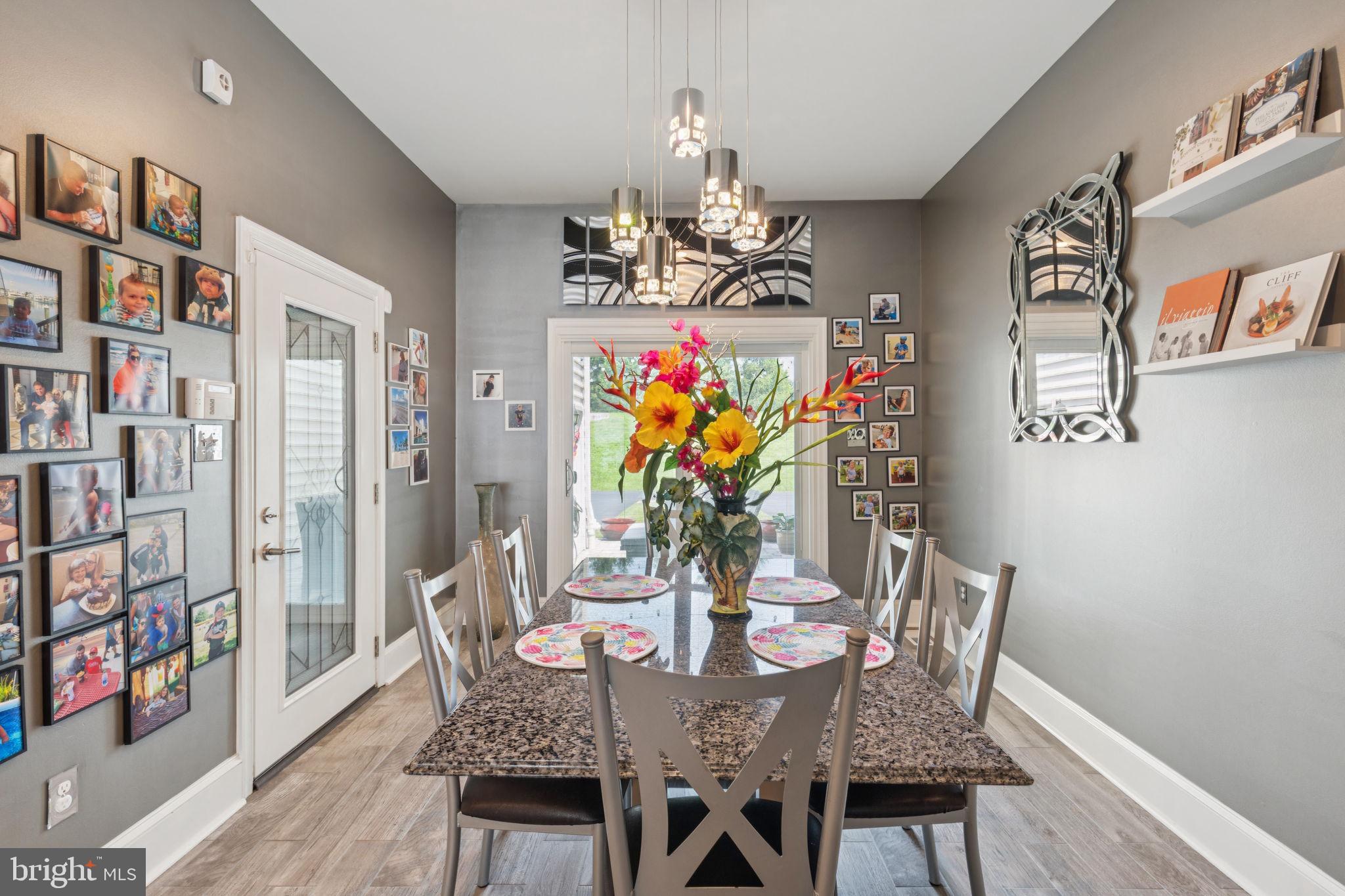 2303 Roma Drive Philadelphia, PA 19145 - Photo 27 of 80 a view of a dining room with furniture and wooden floor