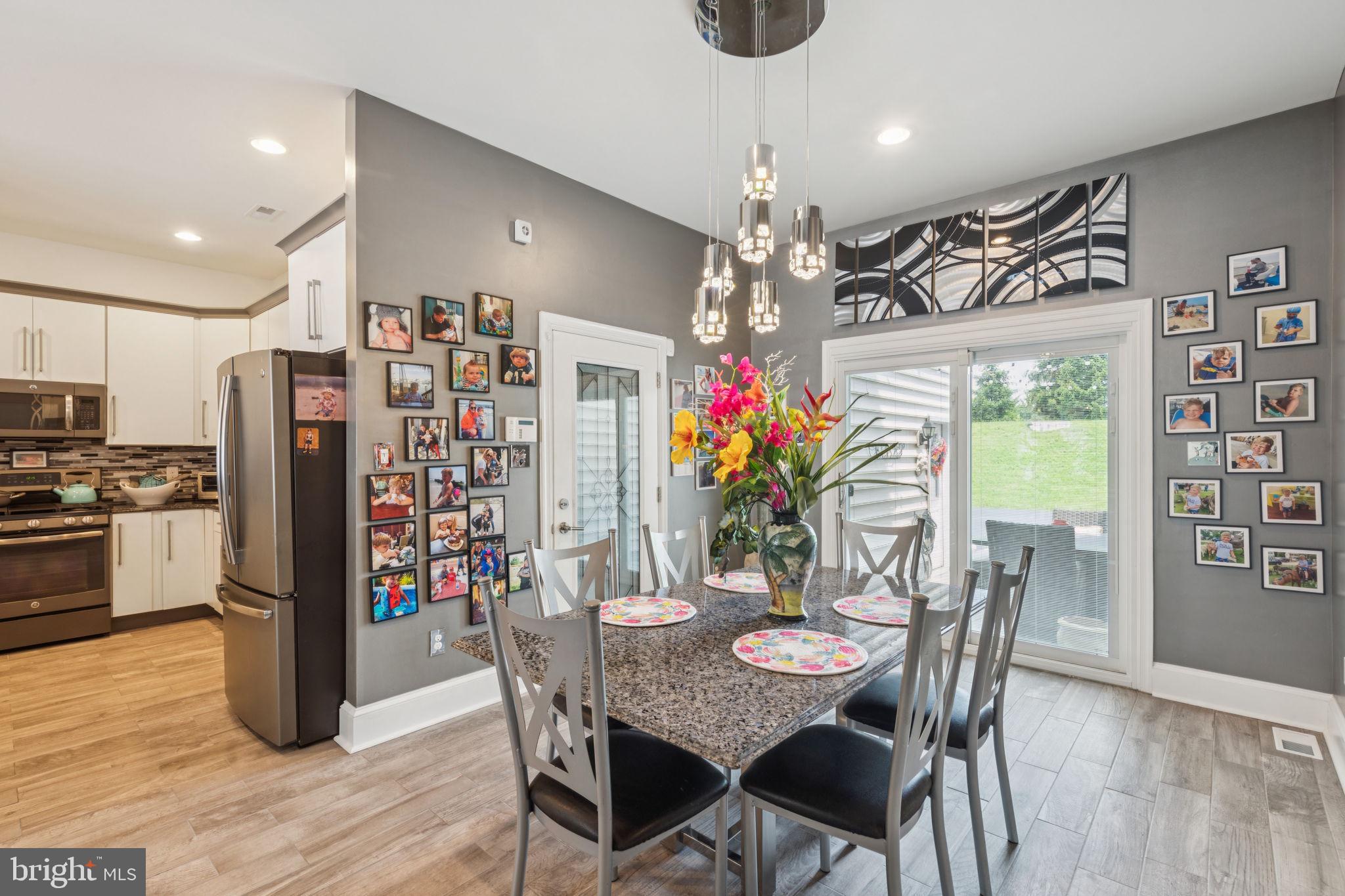 2303 Roma Drive Philadelphia, PA 19145 - Photo 29 of 80 a view of a dining room with furniture window and wooden floor