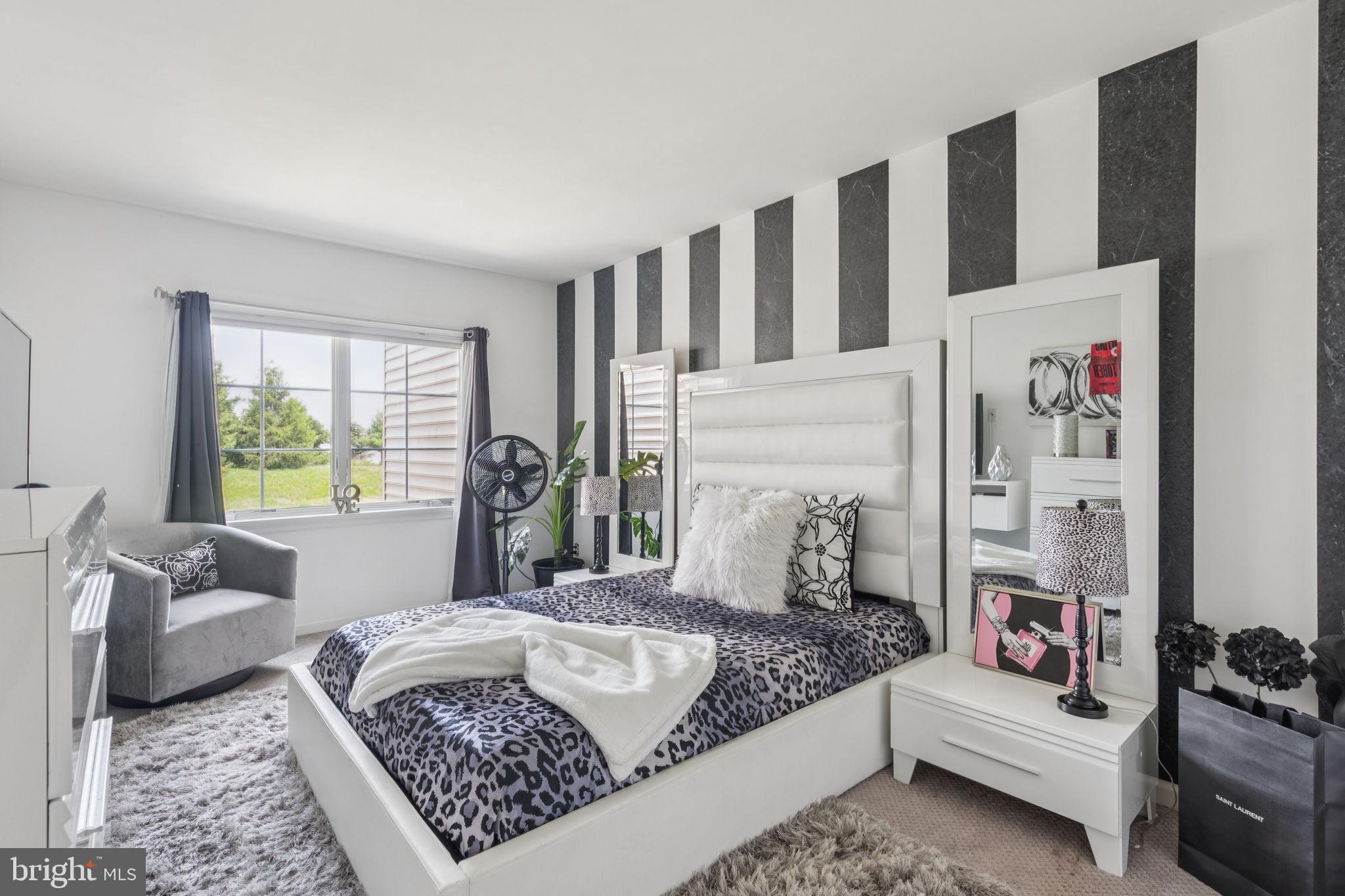 2303 Roma Drive Philadelphia, PA 19145 - Photo 38 of 80 a bed room with a bed and a couch