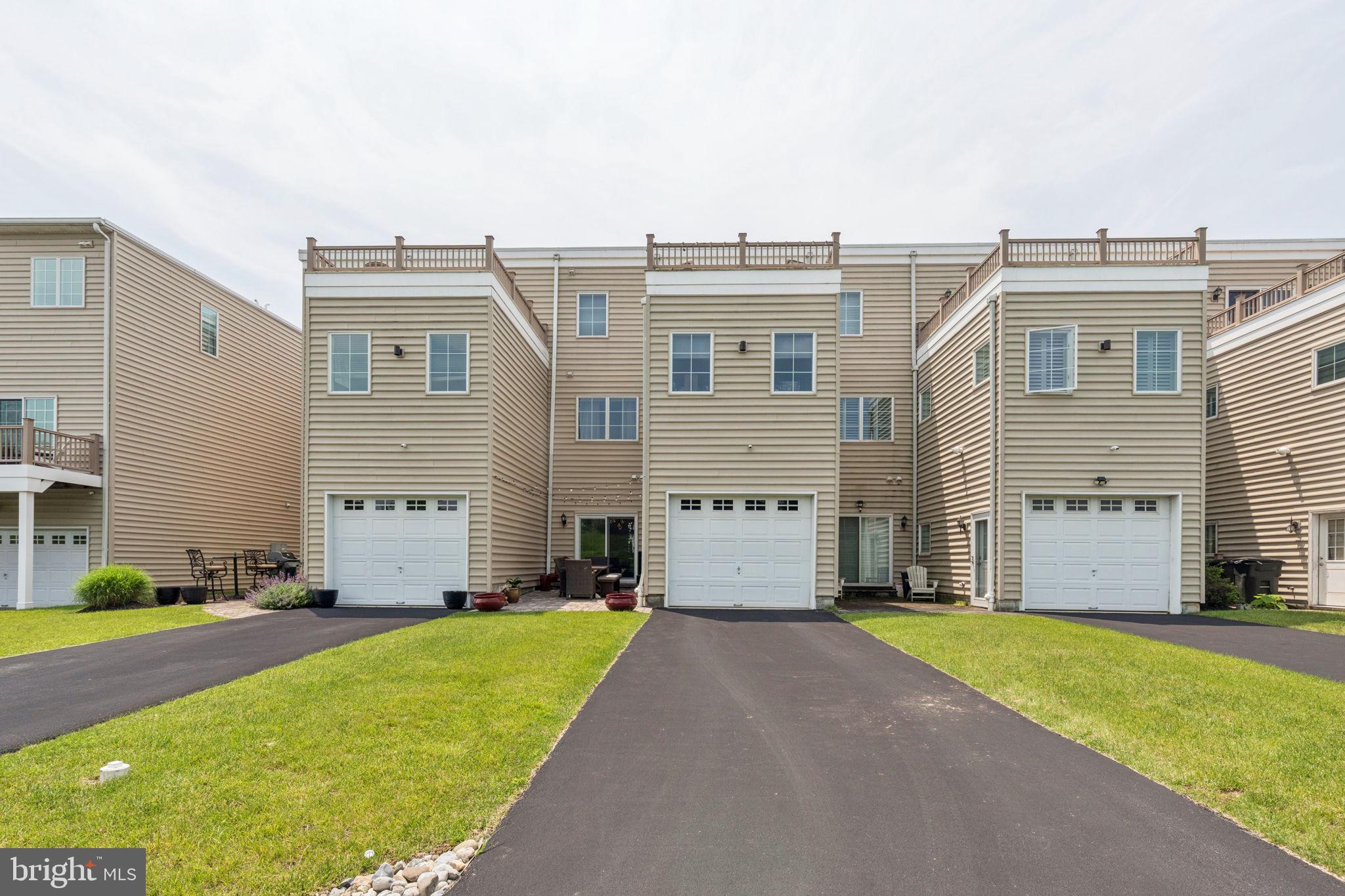 2303 Roma Drive Philadelphia, PA 19145 - Photo 5 of 80 a front view of a house with a yard