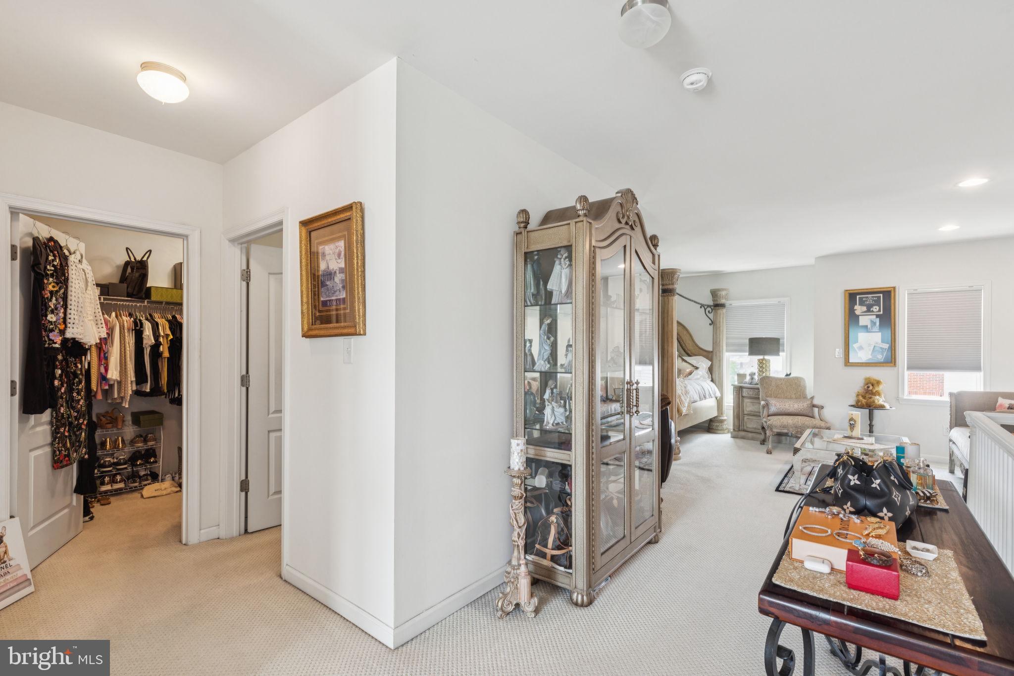 2303 Roma Drive Philadelphia, PA 19145 - Photo 55 of 80 a living room with furniture a flat screen tv and a rug