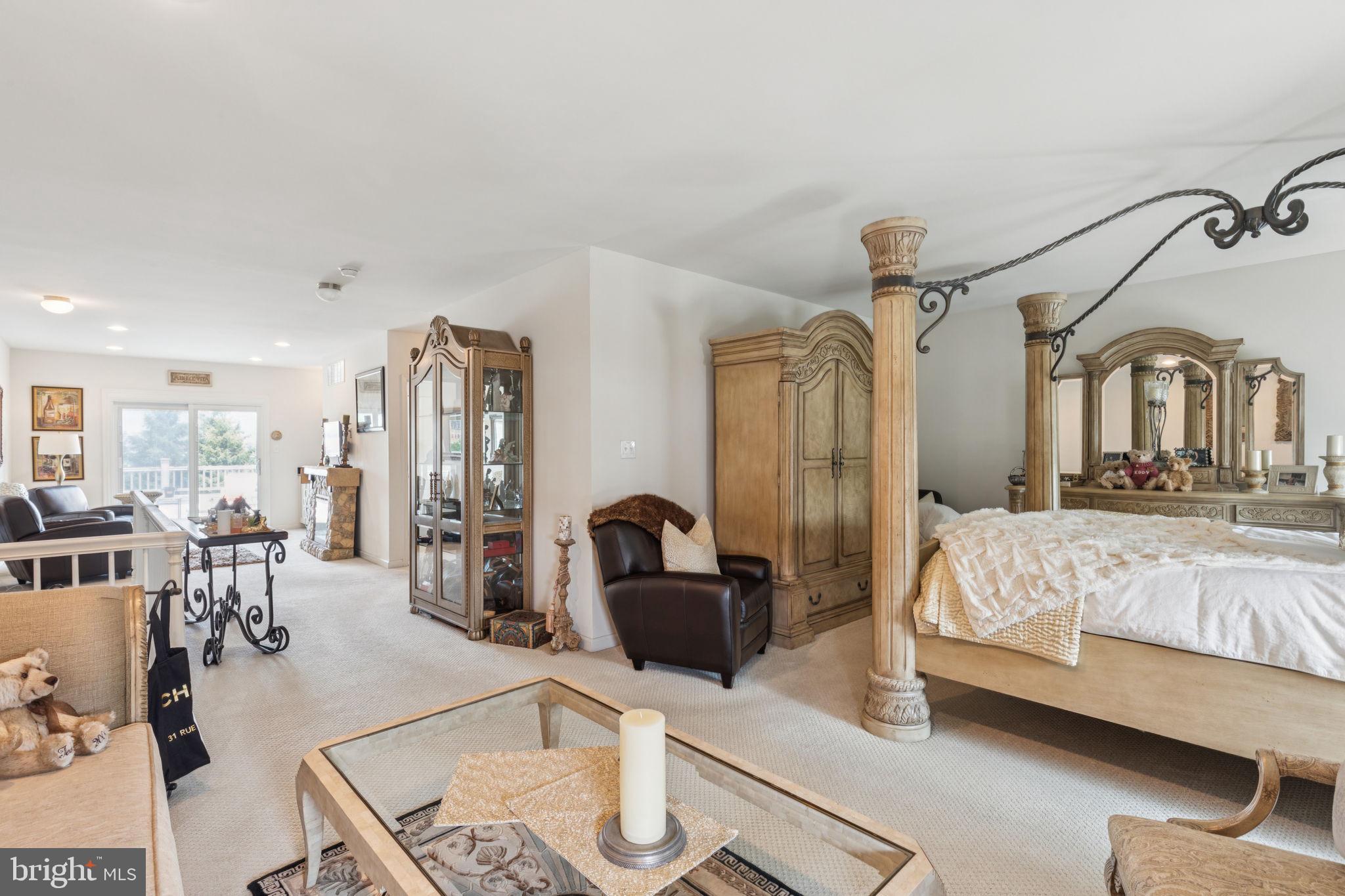 2303 Roma Drive Philadelphia, PA 19145 - Photo 60 of 80 a bedroom with furniture a bed and a large mirror