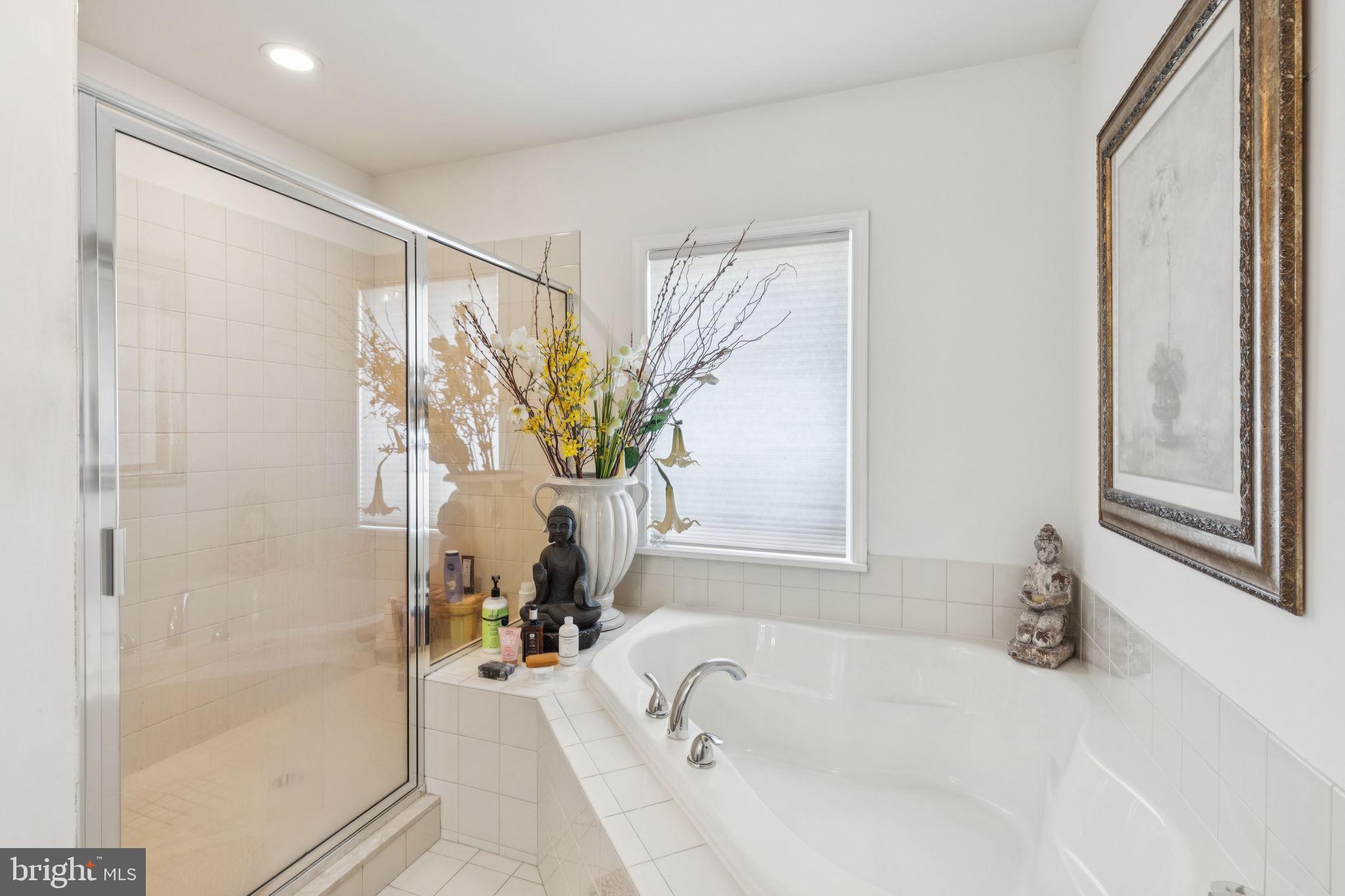 2303 Roma Drive Philadelphia, PA 19145 - Photo 70 of 80 a bathroom with a bathtub and a shower