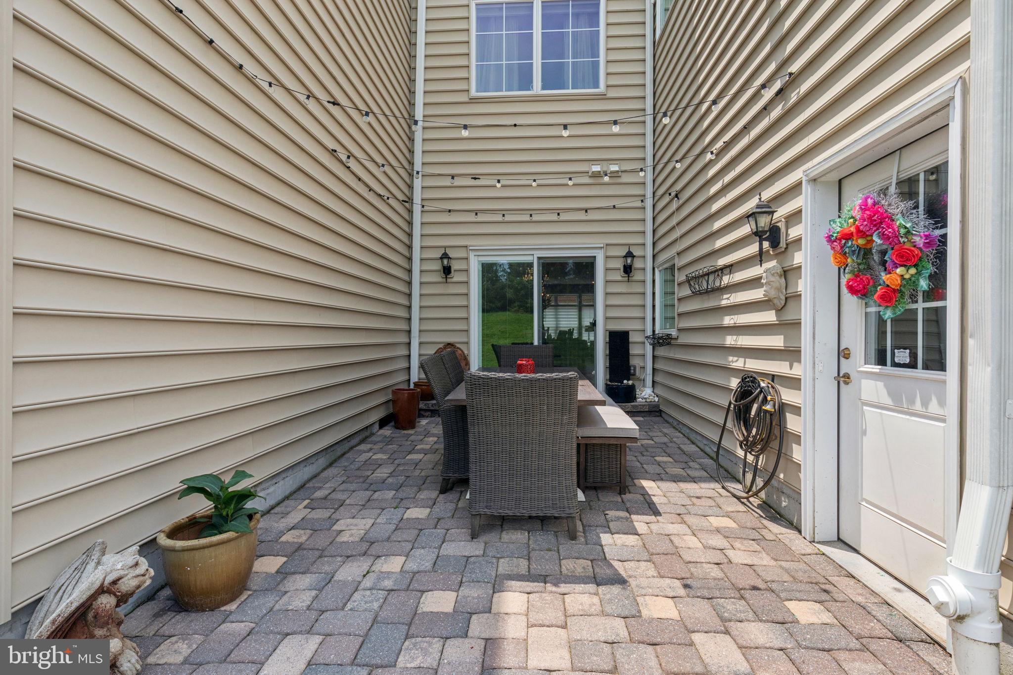 2303 Roma Drive Philadelphia, PA 19145 - Photo 9 of 80 a view of a patio with chairs and potted plants