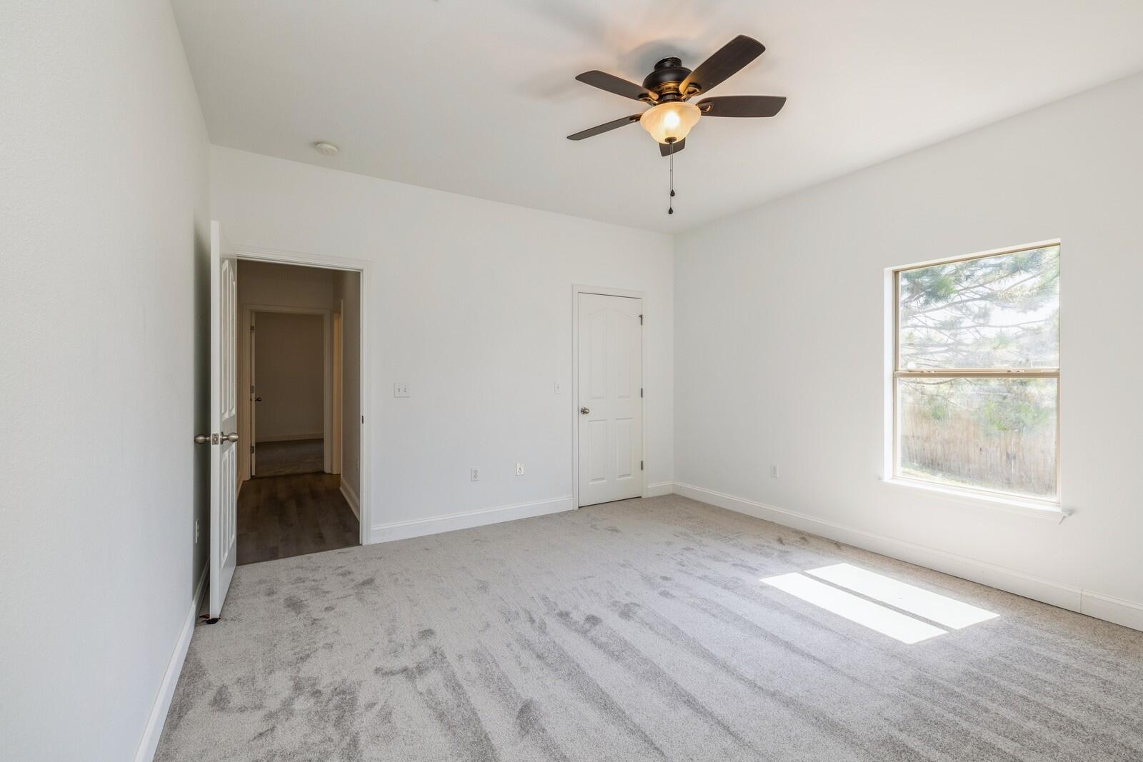 410 Wych Circle Crestview, FL 32536 - Photo 11 of 34 a view of an empty room with a window