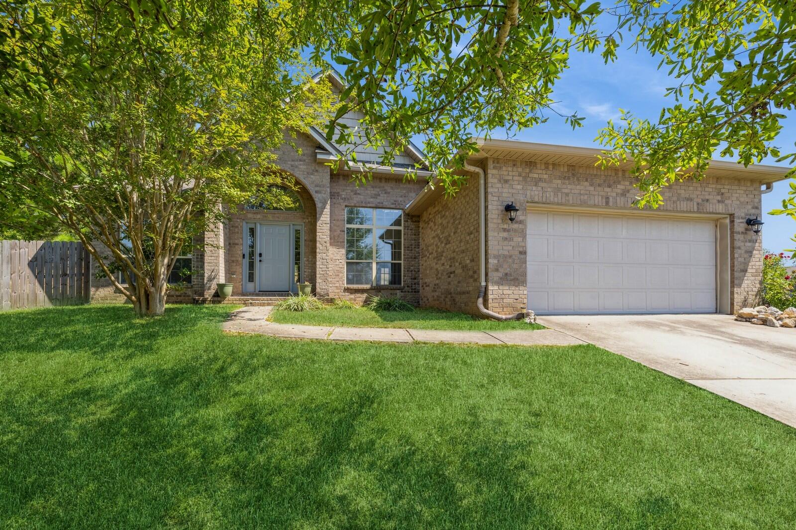 410 Wych Circle Crestview, FL 32536 - Photo 19 of 34 a front view of house with yard and green space