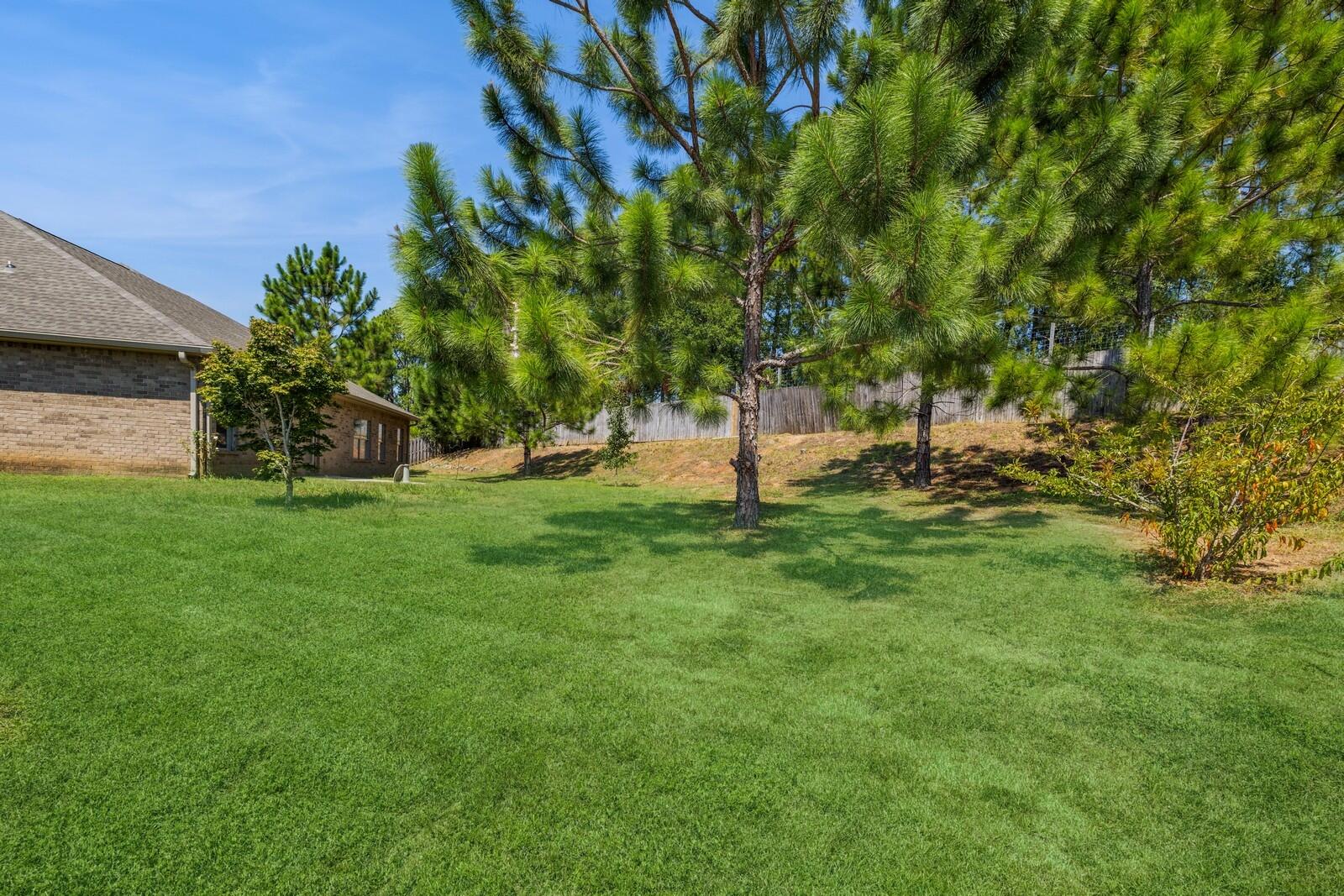 410 Wych Circle Crestview, FL 32536 - Photo 21 of 34 a view of a tree in a yard
