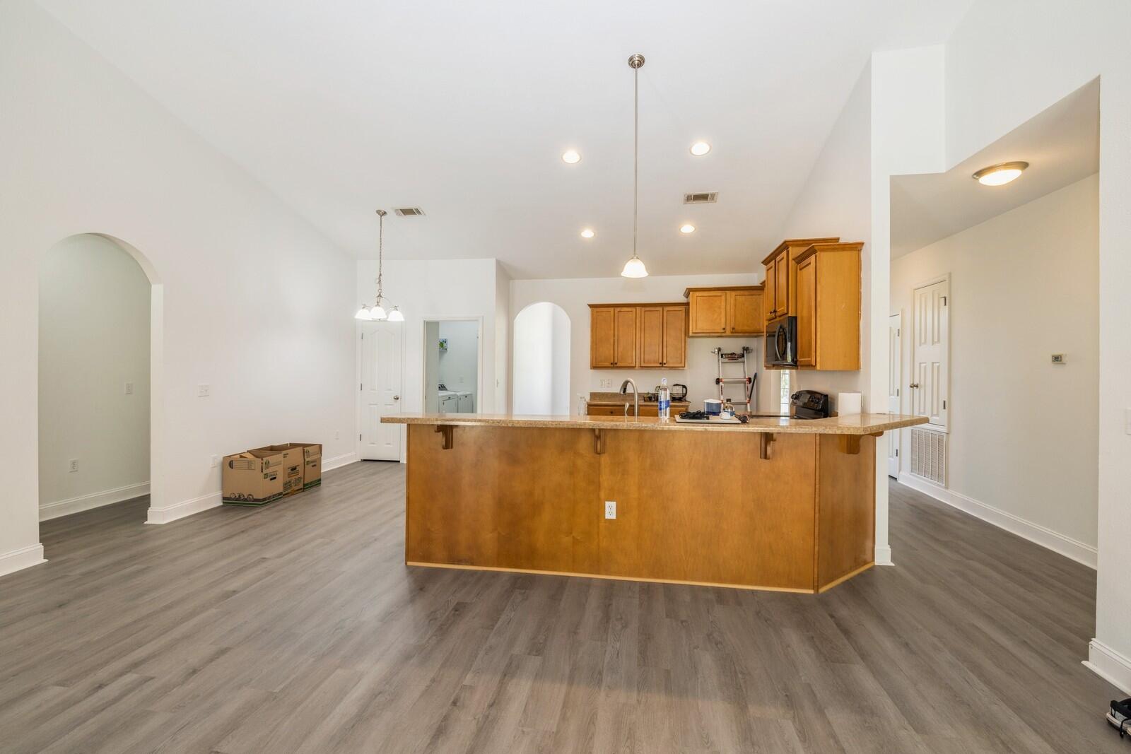 410 Wych Circle Crestview, FL 32536 - Photo 26 of 34 a view of kitchen with cabinets and wooden floor
