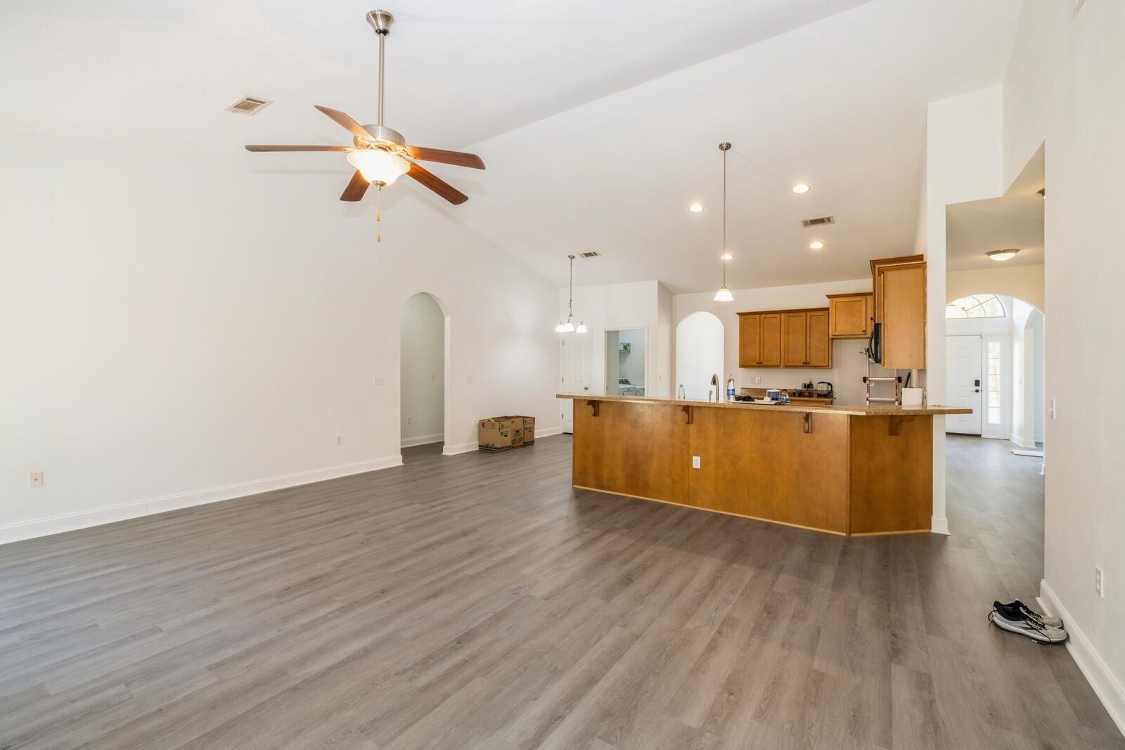 410 Wych Circle Crestview, FL 32536 - Photo 27 of 34 a view of kitchen and a kitchen with wooden floor