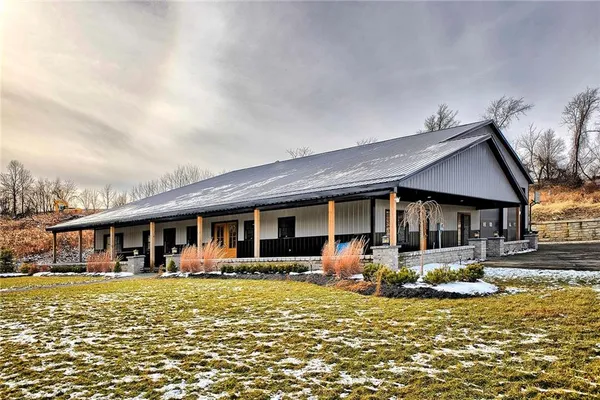 front view of a house with a patio