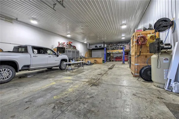 a view of parking garage with cars