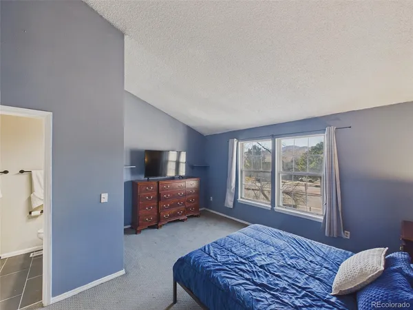 $360,000 | 9715 West Chatfield Avenue, Unit E, Littleton, CO 80128