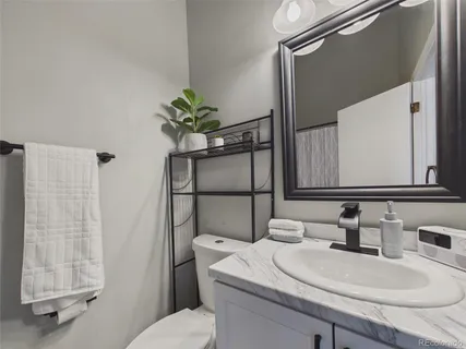 $380,000 | 9715 West Chatfield Avenue, Unit E, Littleton, CO 80128