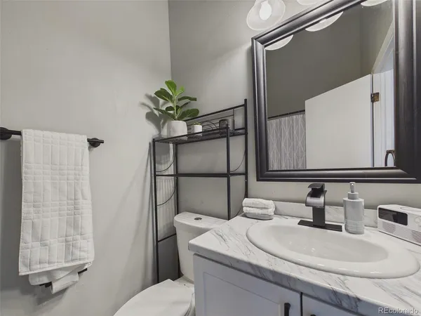 $360,000 | 9715 West Chatfield Avenue, Unit E, Littleton, CO 80128