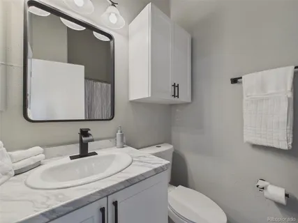 $380,000 | 9715 West Chatfield Avenue, Unit E, Littleton, CO 80128