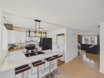 $380,000 | 9715 West Chatfield Avenue, Unit E, Littleton, CO 80128