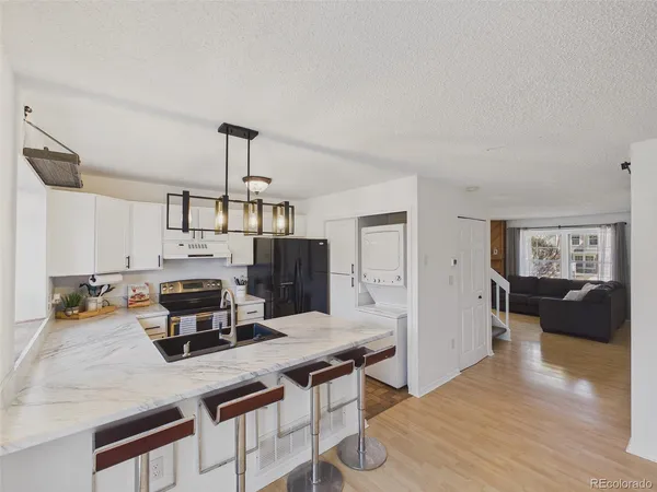 $360,000 | 9715 West Chatfield Avenue, Unit E, Littleton, CO 80128