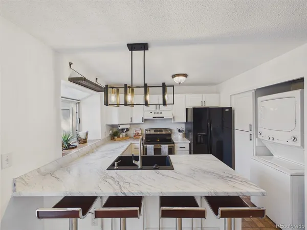 $360,000 | 9715 West Chatfield Avenue, Unit E, Littleton, CO 80128