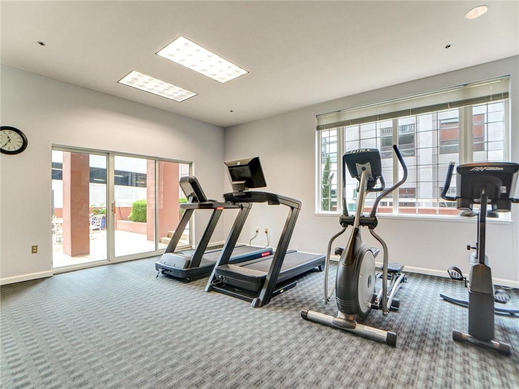 3435 Kingsboro Road Northeast, Unit 1601 Atlanta, GA 30326 - Photo 48 of 54 a view of a room with gym equipment