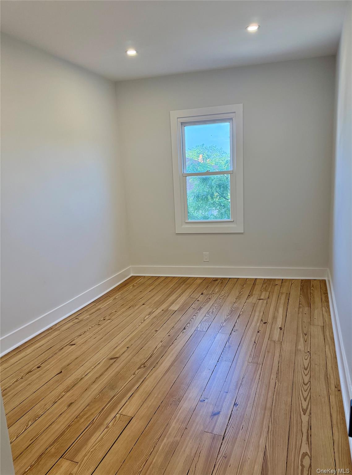 44 Purchase Street, Unit 3L Rye, NY 10580 - Photo 11 of 16 Bright first bedroom appointed with dedicated closet