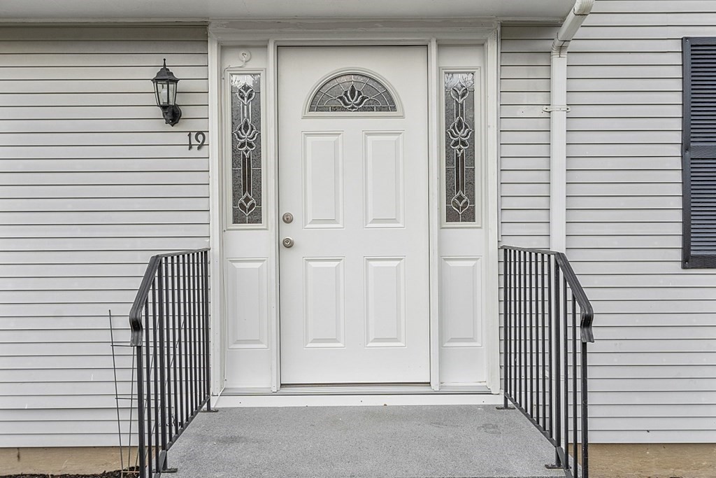 19 South Hampton Road Amesbury, MA 01913 - Photo 4 of 42 a view of a door and a door