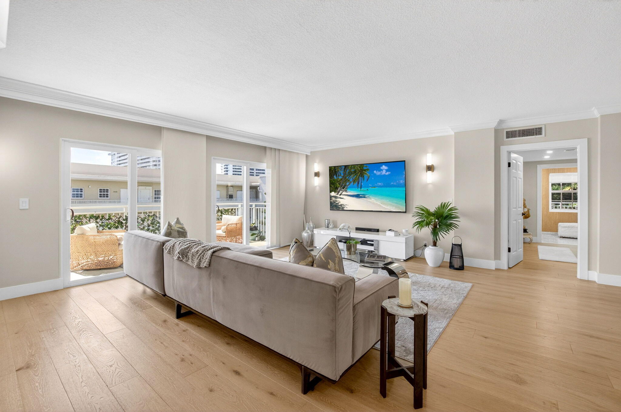950 De Soto Road, Unit 5A Boca Raton, FL 33432 - Photo 9 of 98 a living room with furniture and a large window