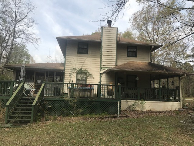 7012 South Rogers Road Lizella, GA 31052 - Photo 3 of 23 a front view of house with stairs