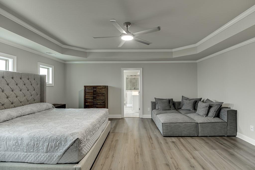 914 Rainsong Court Braselton, GA 30517 - Photo 16 of 37 a bedroom with bed and window